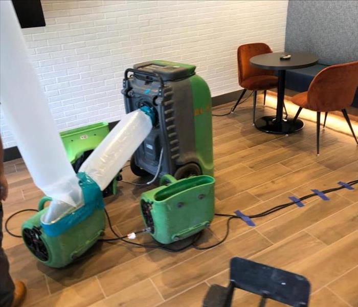 Air movers and dehumidifier in business.